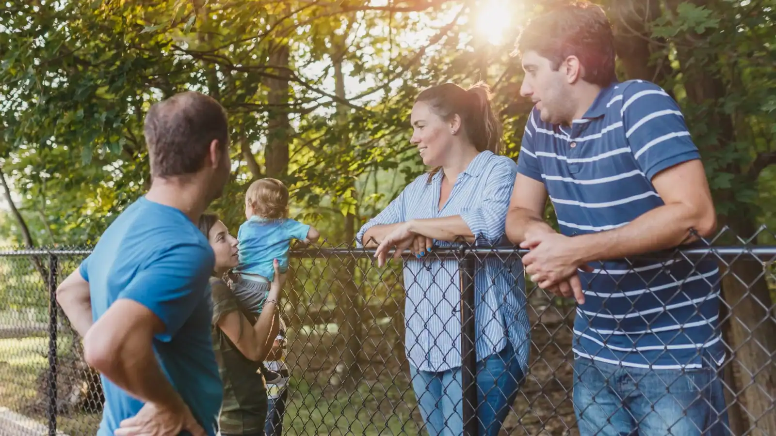 Family enjoying outdoor park, promoting customer referral rewards.